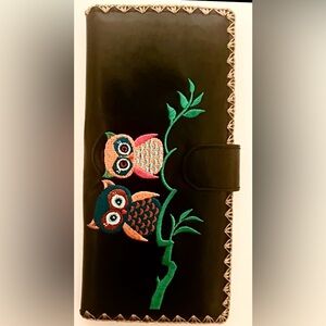 Lavishly black, vegan leather, with colorful, owls embroidered wallet